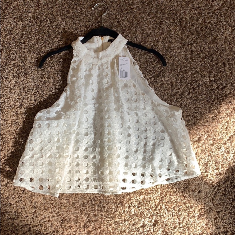 Large top with a sort of bubble print to it.